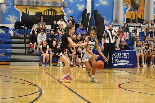Spartan player dribbling basketball