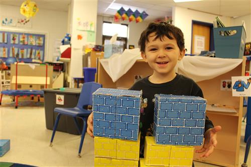 Student building with blocks 