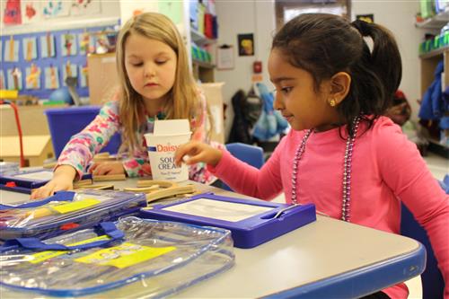 Students working on preschool project 
