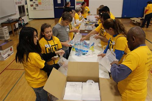 Students packing boxes 